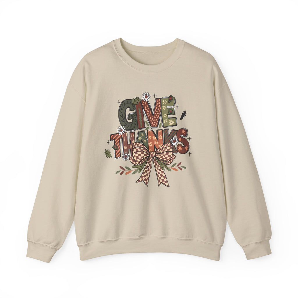 Sand Give Thanks sweatshirt with patterned autumn lettering, a gingham bow and fall leaves, front view