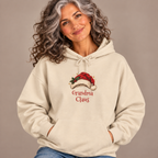 Woman wearing the Sand Grandma Claus Hoodie with jeans