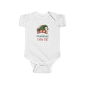 White Grandma's Little Elf baby bodysuit with a green elf hat and holly, front view