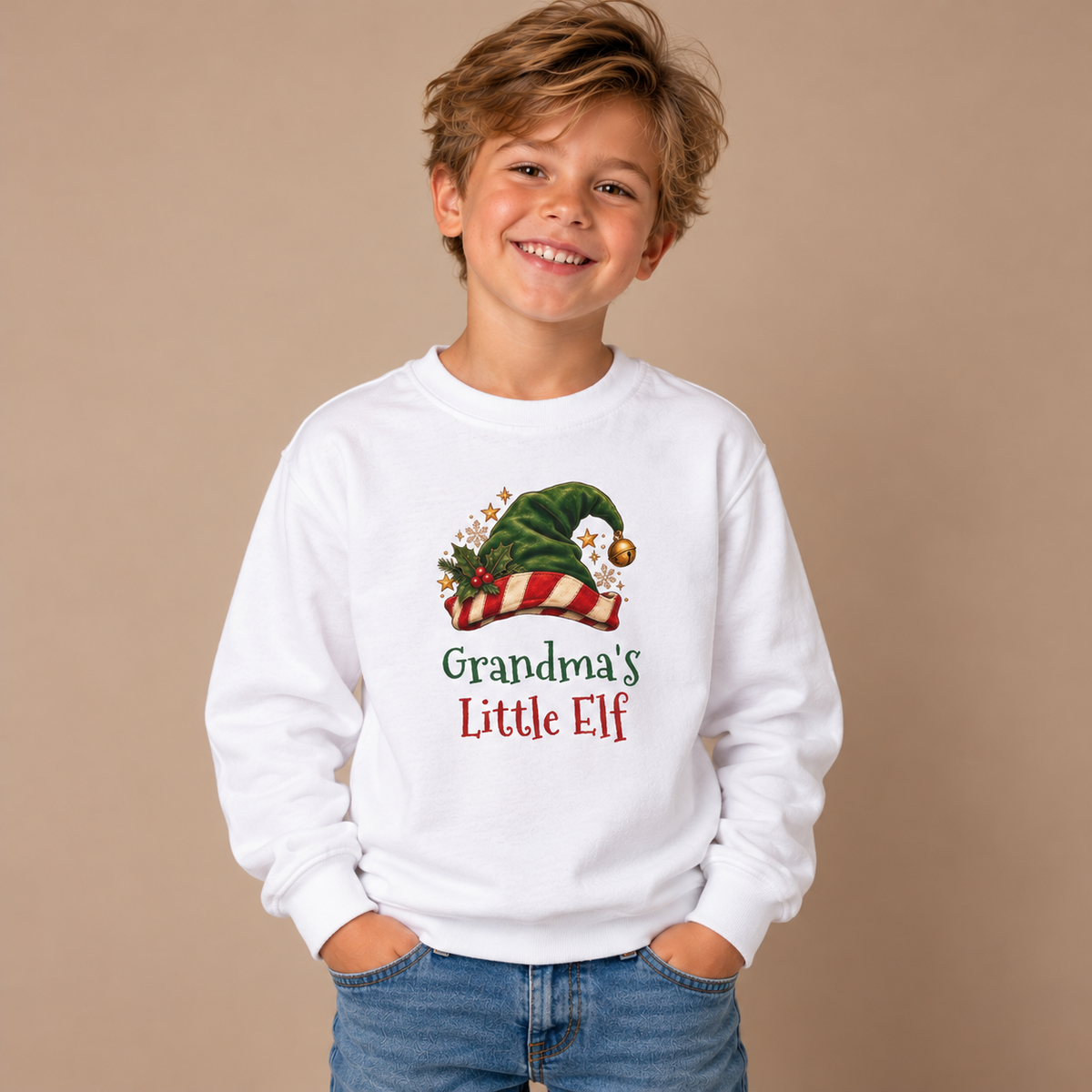 Boy wearing the White Grandma's Little Elf Youth Sweatshirt
