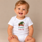 Baby wearing the White Grandpa's Little Elf Baby Bodysuit