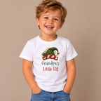 Boy wearing the White Grandpa's Little Elf Toddler T-Shirt