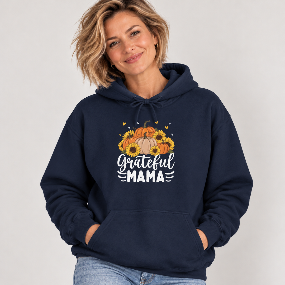 Woman wearing the Navy Grateful Mama Hoodie with jeans