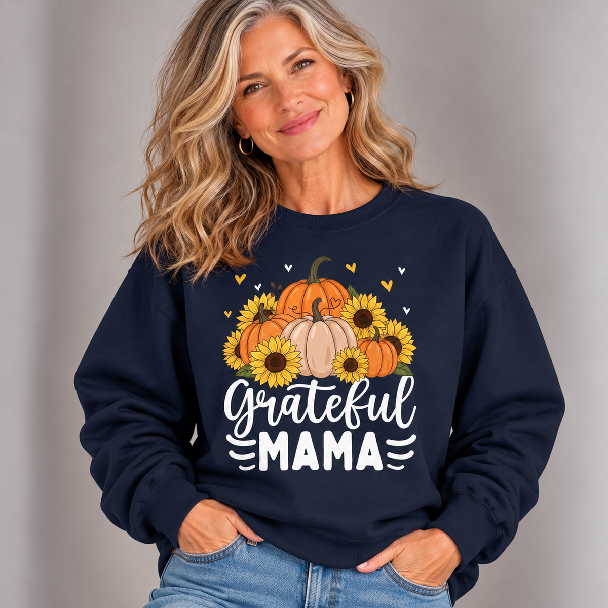 Woman wearing the Navy Grateful Mama Sweatshirt with jeans
