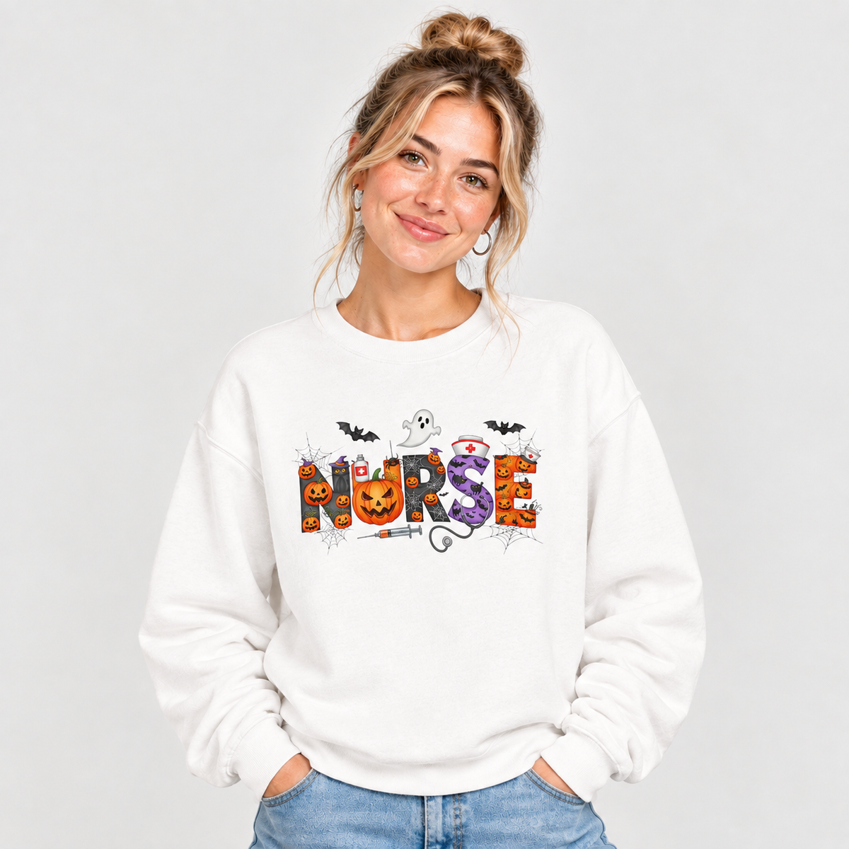 Woman wearing the white Halloween Nurse Pumpkin Sweatshirt with jeans