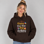 Woman wearing the Dark Chocolate Happy New Year And Yes It's My Birthday Hoodie with jeans