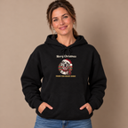 Woman wearing the Black Merry Christmas From The Great Dane Hoodie (harlequin Great Dane) with jeans