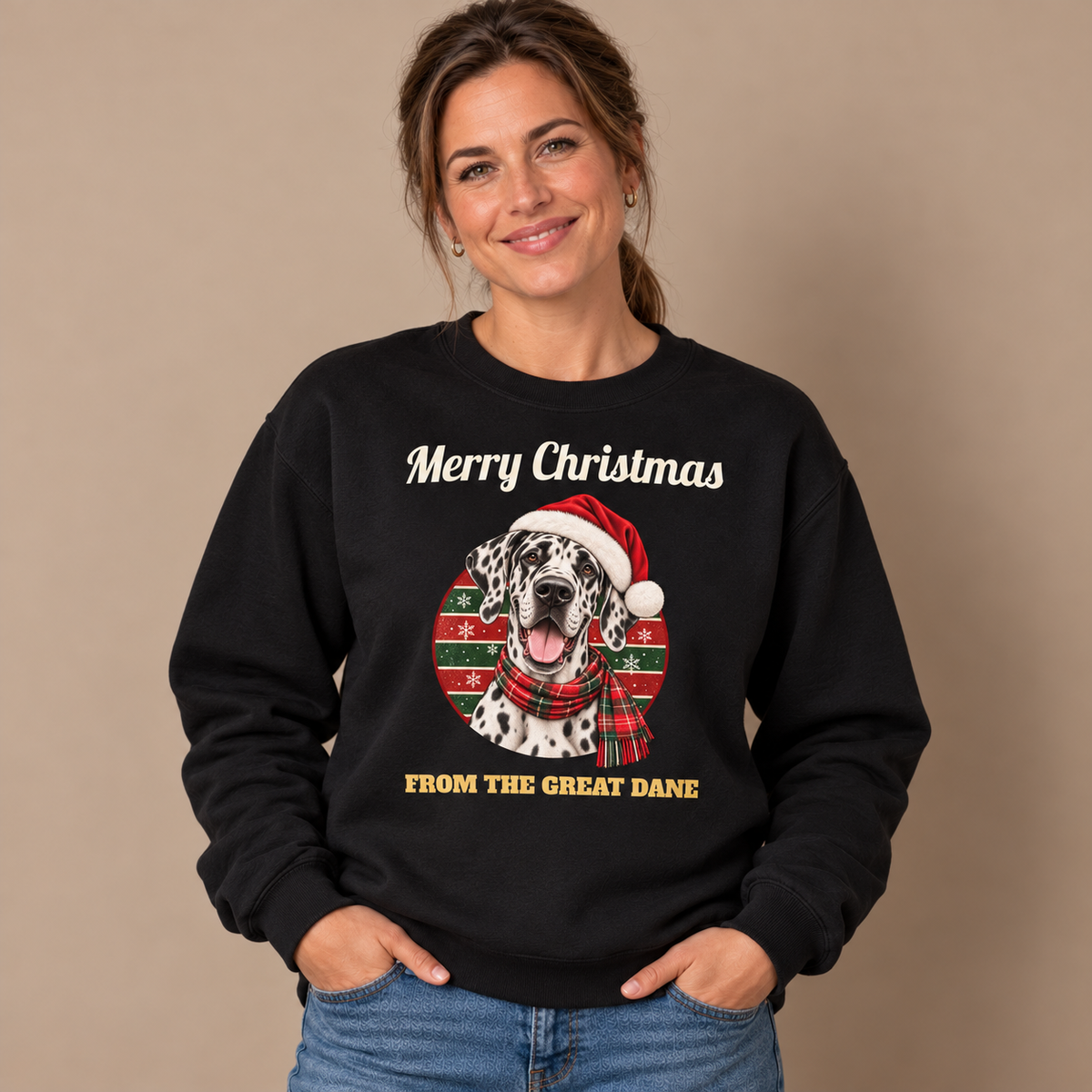 Woman wearing the Black Merry Christmas From The Great Dane Sweatshirt (harlequin Great Dane) with jeans