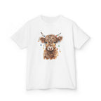 White Highland Cow With Christmas Lights kids t-shirt with a watercolor highland cow wearing colorful Christmas lights, front view