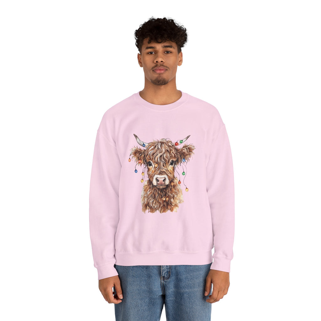 Man wearing the Light Pink Highland Cow With Christmas Lights Sweatshirt