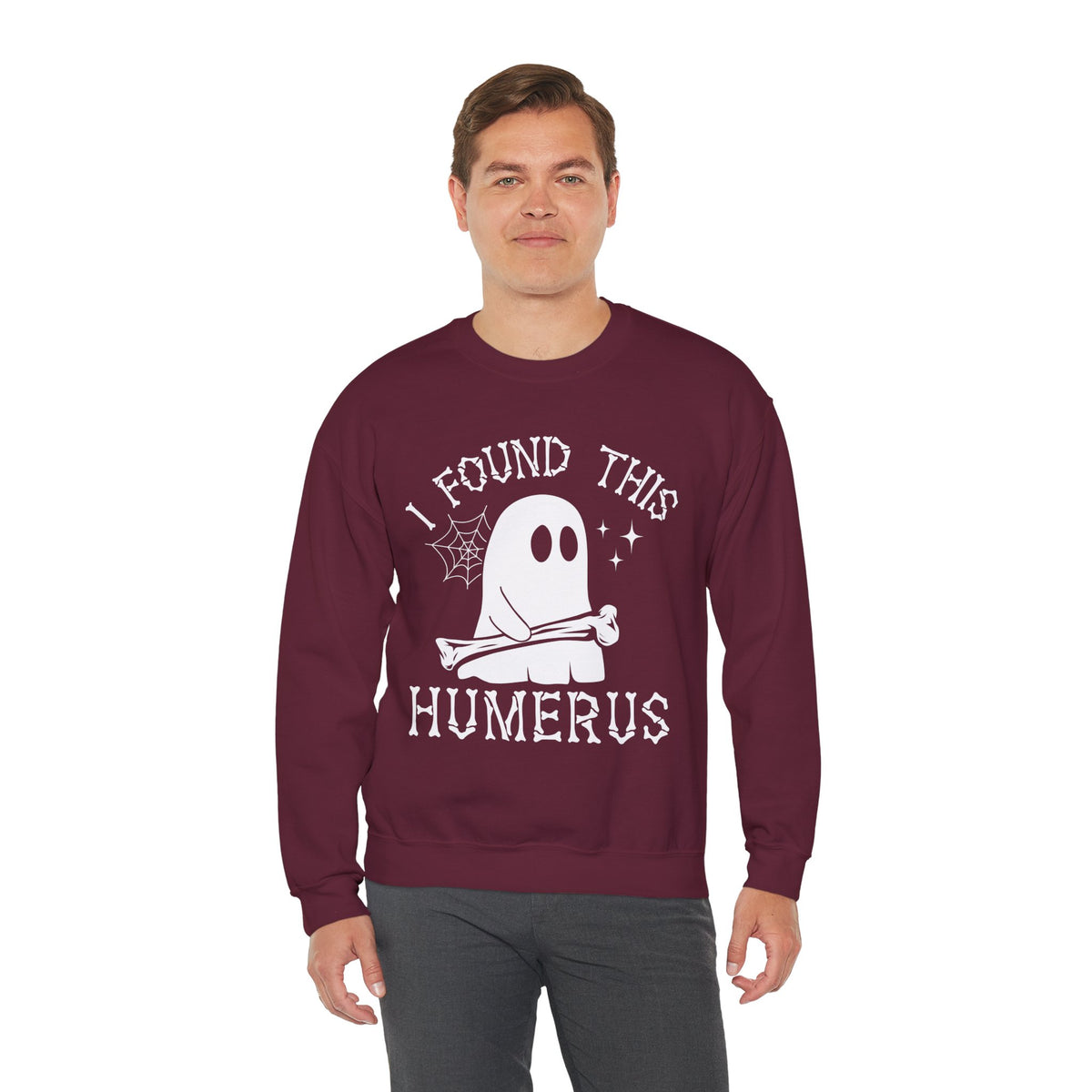 Man wearing the I Found This Humerus ghost sweatshirt, front view