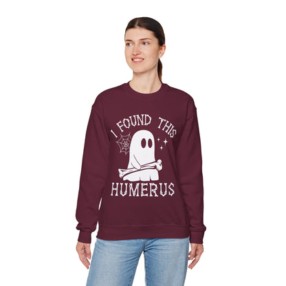 Woman wearing the I Found This Humerus ghost sweatshirt, front view