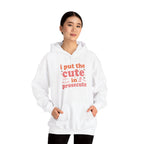 Woman wearing the I Put The Cute In Prosecute lawyer hoodie, hands in pocket