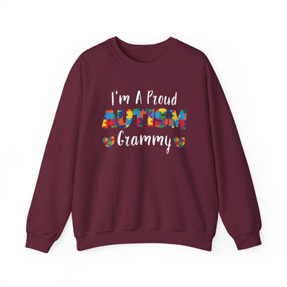 Maroon I'm A Proud Autism Grammy sweatshirt with puzzle piece lettering and hearts