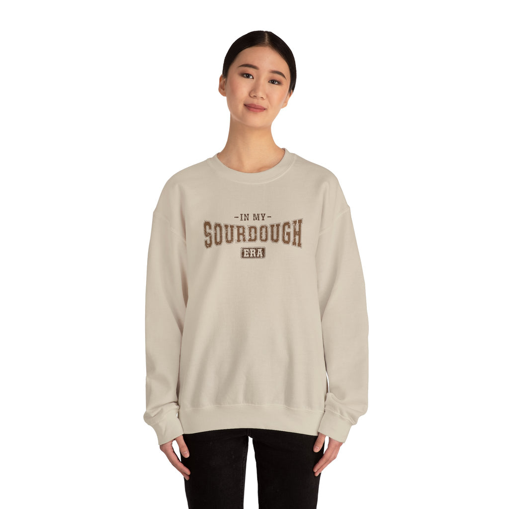 Woman wearing the sand In My Sourdough Era Sweatshirt
