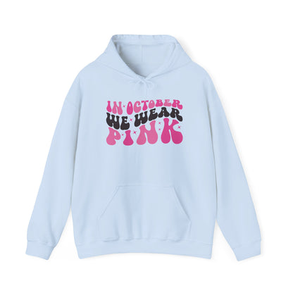 Light blue In October We Wear Pink retro hoodie with groovy lettering