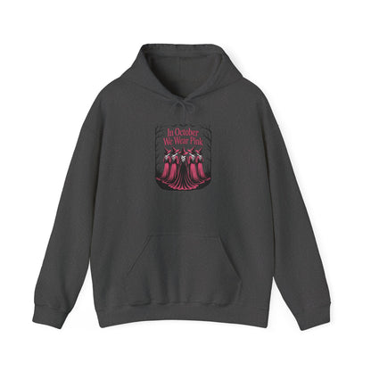 Dark heather In October We Wear Pink hoodie with five witches in pink gowns