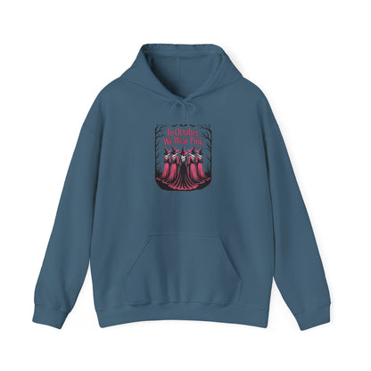 Indigo blue In October We Wear Pink hoodie with five witches in pink gowns