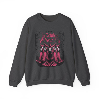 Dark heather In October We Wear Pink sweatshirt with five witches in pink gowns