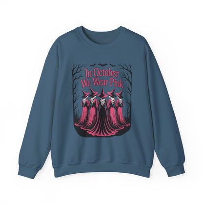 Indigo blue In October We Wear Pink sweatshirt with five witches in pink gowns
