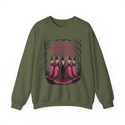 Military green In October We Wear Pink sweatshirt with five witches in pink gowns