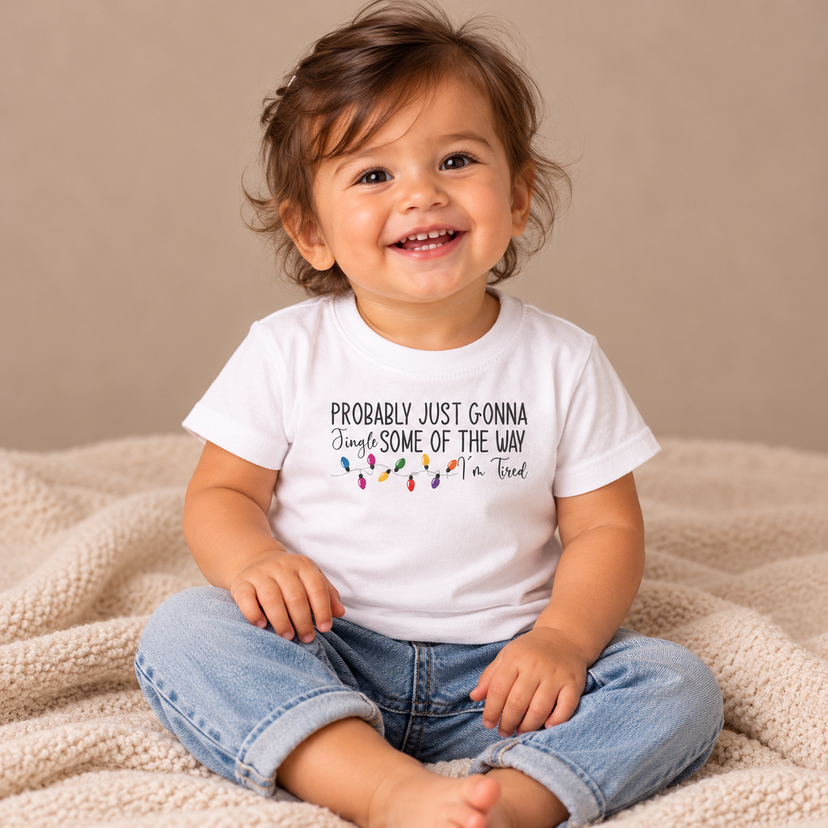 Baby wearing the White Jingle Some Of The Way Funny Christmas Baby T-Shirt