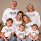 Three generations wearing matching Jingle Some Of The Way Christmas sweatshirts and kids shirts