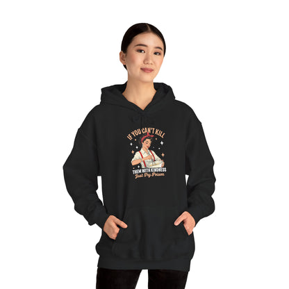 Woman wearing the Kill Them With Kindness Just Try Poison retro pin-up hoodie, hands in pocket