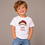 Toddler wearing the White Little Claus Toddler T-Shirt with jeans
