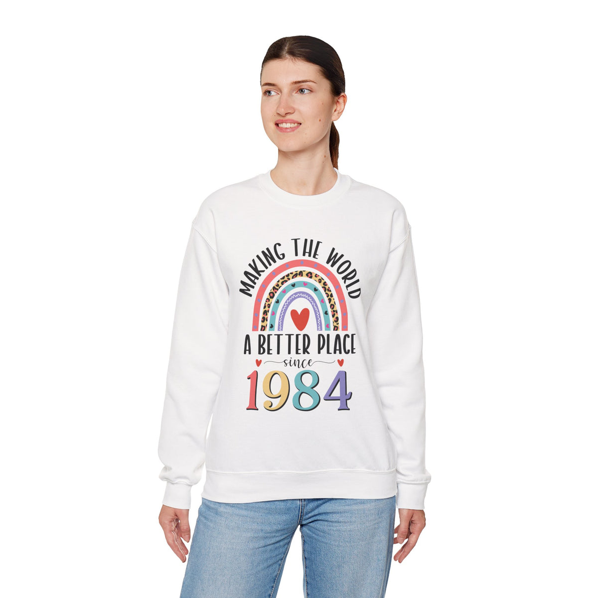 Woman wearing the White Making The World A Better Place Since 1984 rainbow sweatshirt, side view