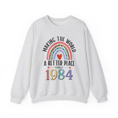 Ash Making The World A Better Place Since 1984 rainbow sweatshirt, front view