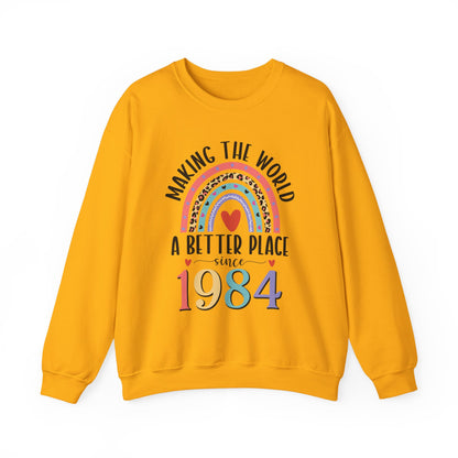 Gold Making The World A Better Place Since 1984 rainbow sweatshirt, front view