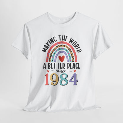 Making The World A Better Place Since 1984 rainbow t-shirt, flat lay