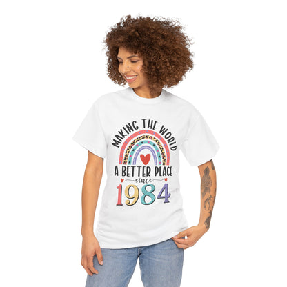 Woman wearing the Making The World A Better Place Since 1984 rainbow t-shirt
