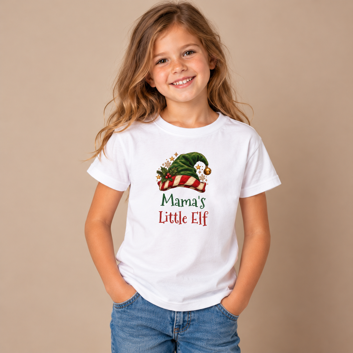 Girl wearing the White Mama's Little Elf Kids T-Shirt