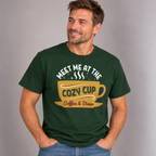Man wearing the Forest Green Meet Me At The Cozy Cup T-Shirt with jeans