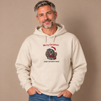 Man wearing the Sand Merry Christmas From The Great Dane Hoodie (merle Great Dane) with jeans