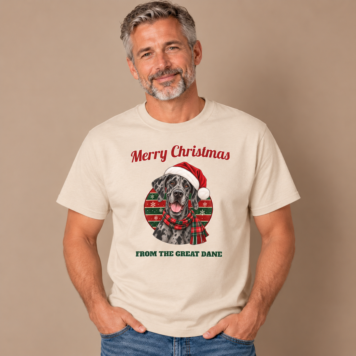 Man wearing the Sand Merry Christmas From The Great Dane T-Shirt (merle Great Dane) with jeans