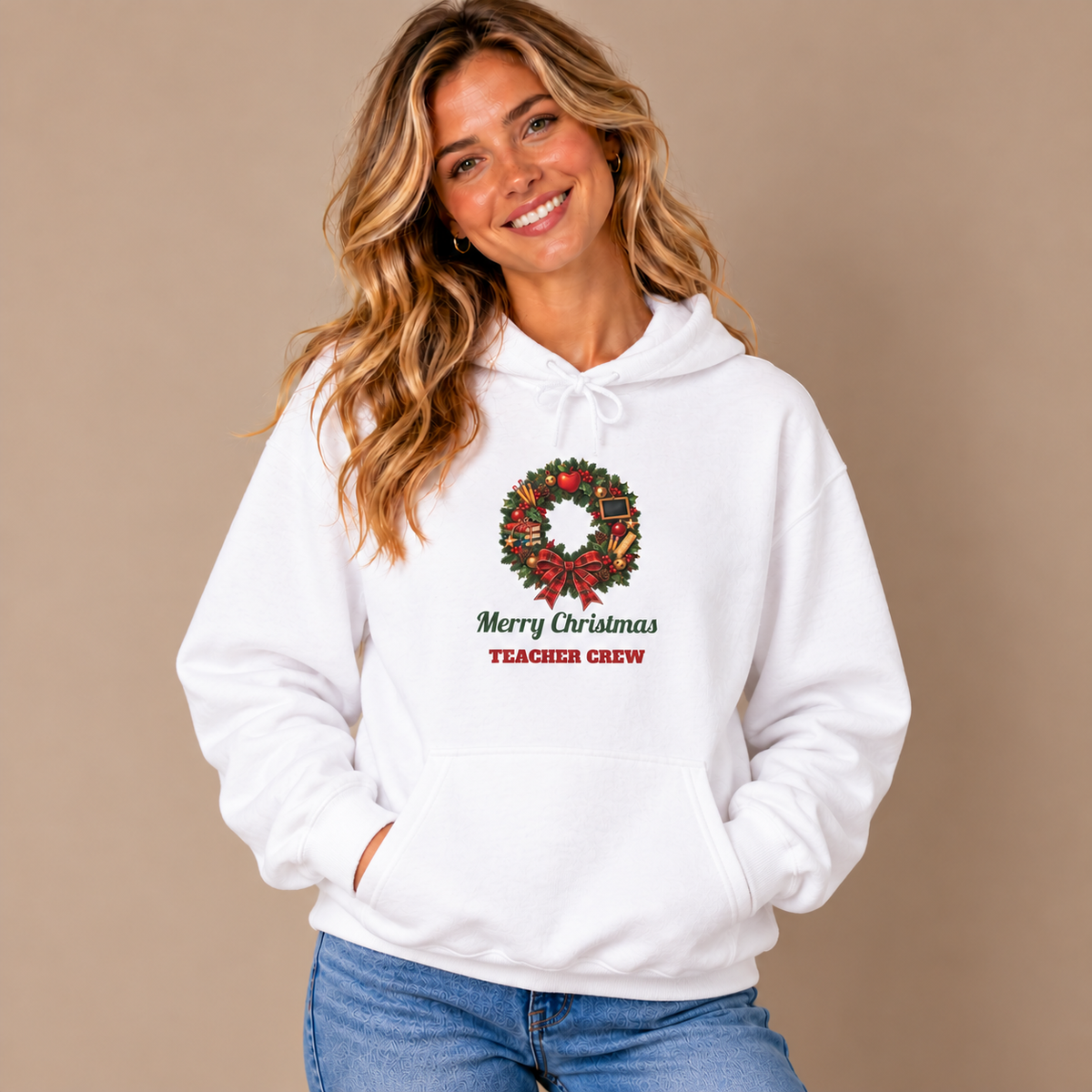 Woman wearing the White Merry Christmas Teacher Crew Hoodie with jeans