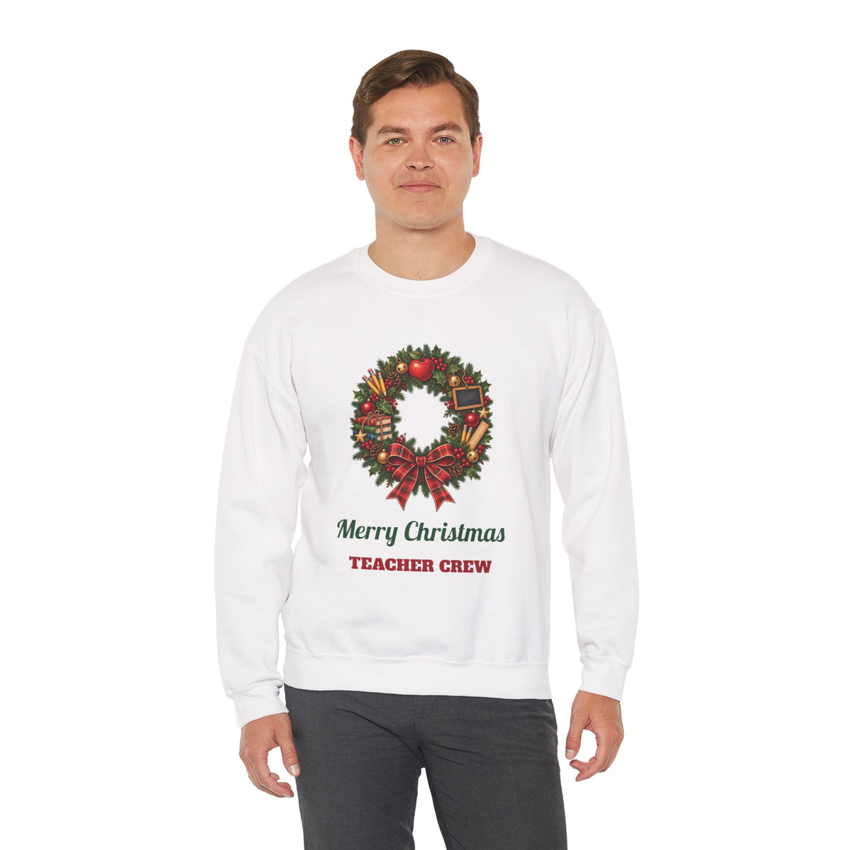 Man wearing the Merry Christmas Teacher Crew Sweatshirt, smiling