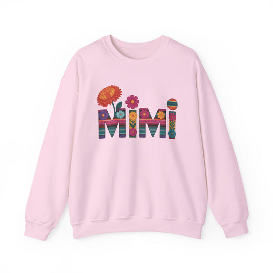 Light pink Mimi floral sweatshirt with serape striped letters and bright flowers