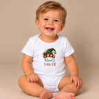 Baby wearing the White Mimi's Little Elf Baby Bodysuit