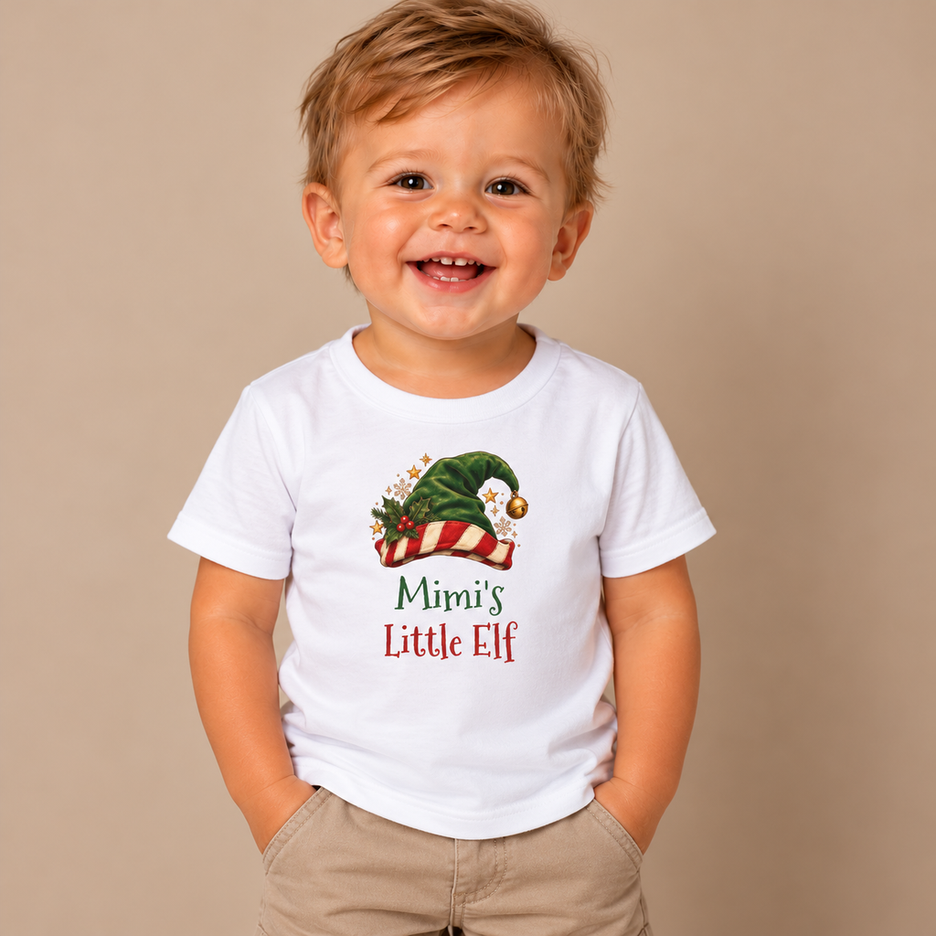 Boy wearing the White Mimi's Little Elf Baby T-Shirt