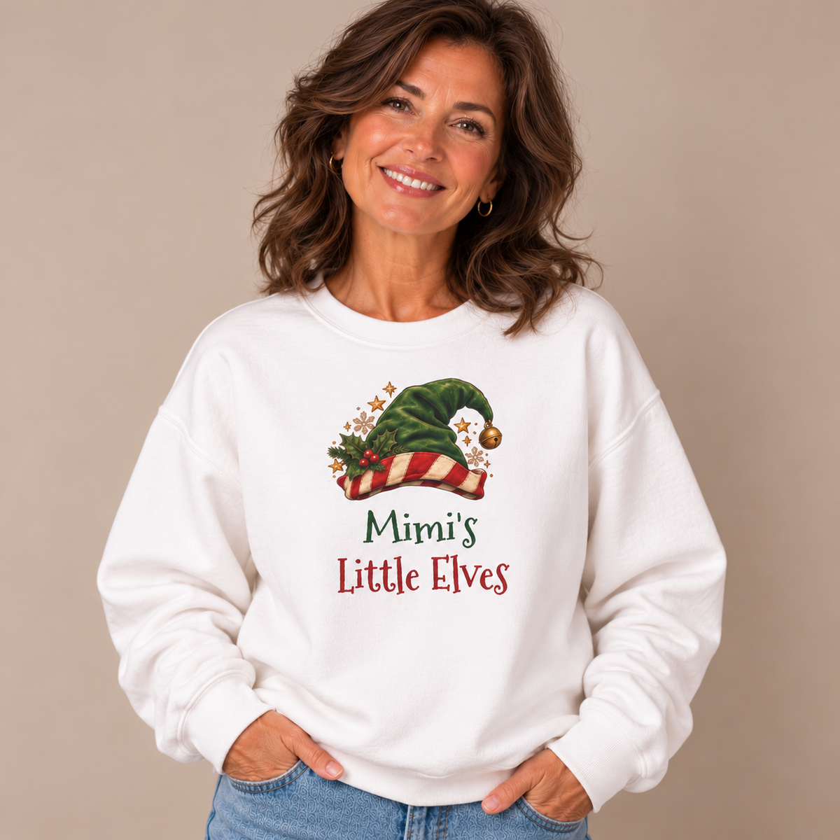 Woman wearing the White Mimi's Little Elves Sweatshirt with jeans