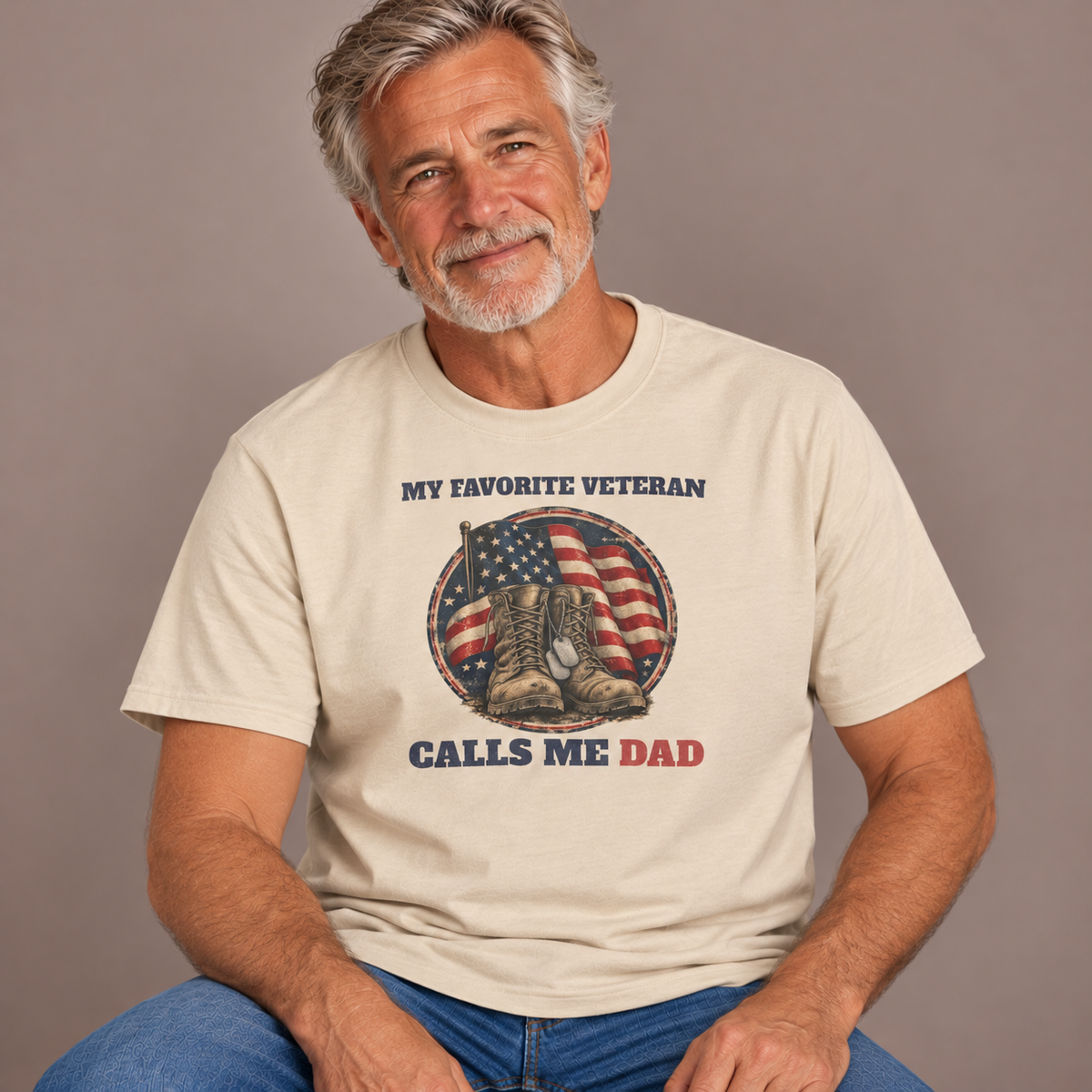 Man wearing the Sand My Favorite Veteran Calls Me Dad T-Shirt with jeans