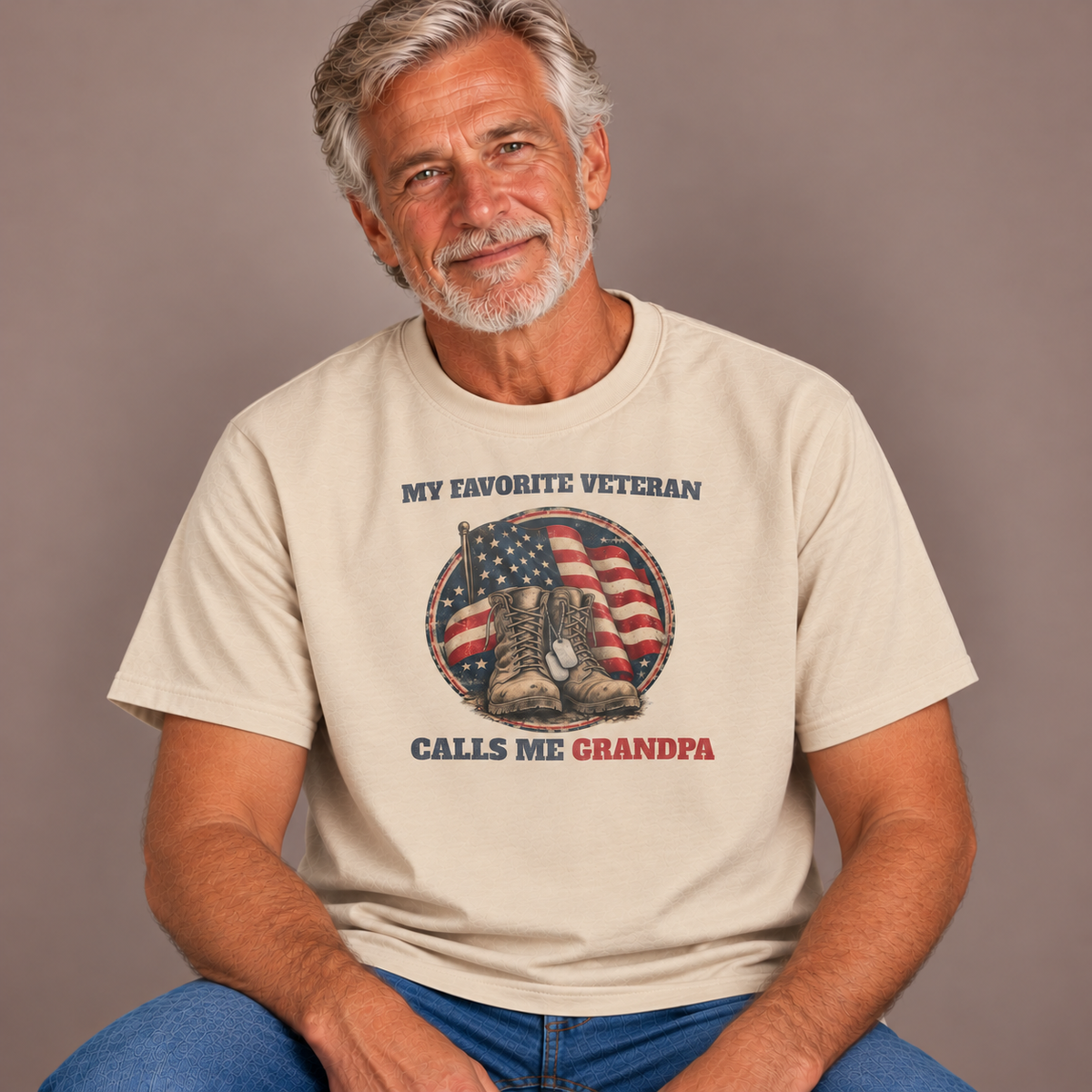 Man wearing the Sand My Favorite Veteran Calls Me Grandpa T-Shirt with jeans