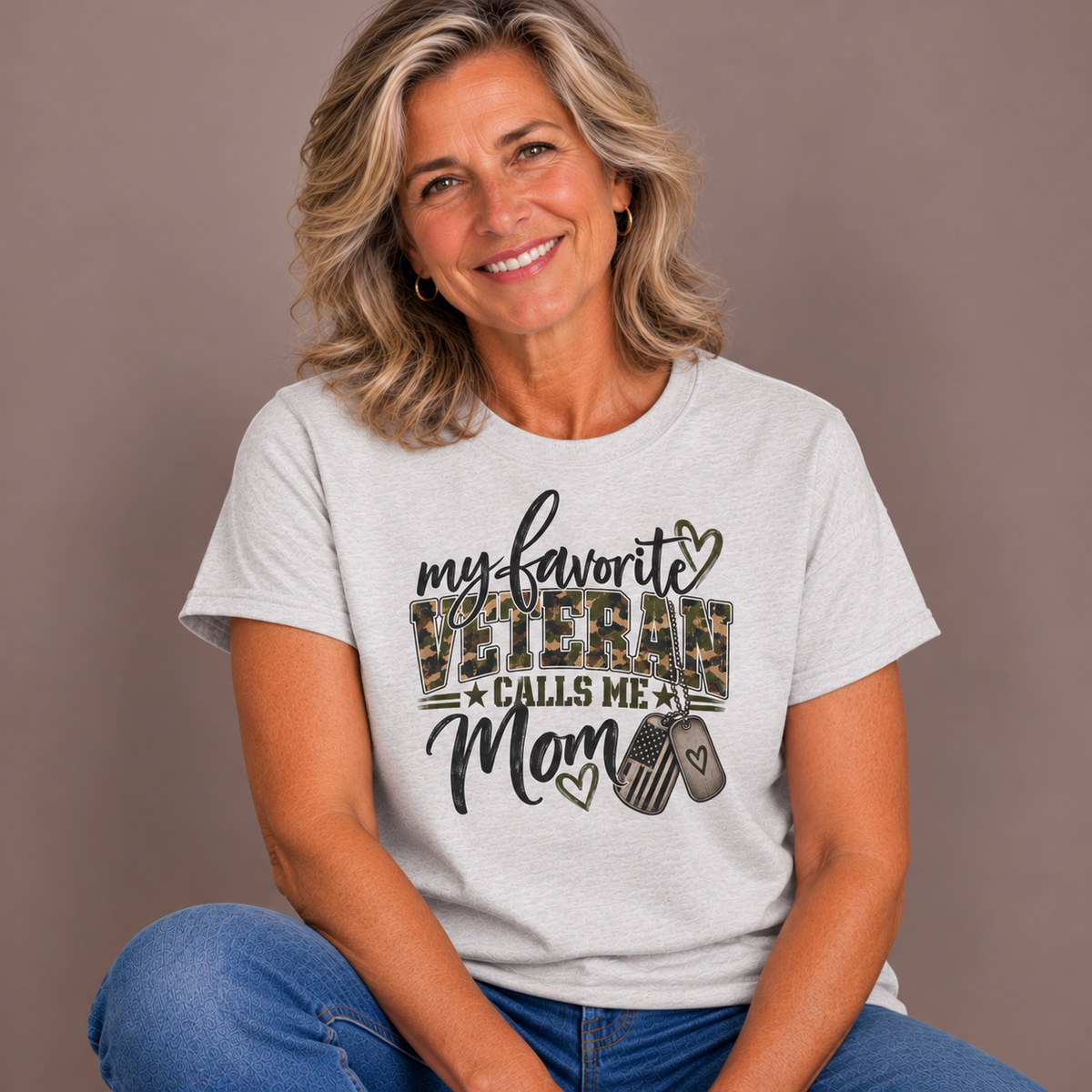 Woman wearing the Ash My Favorite Veteran Calls Me Mom T-Shirt with jeans