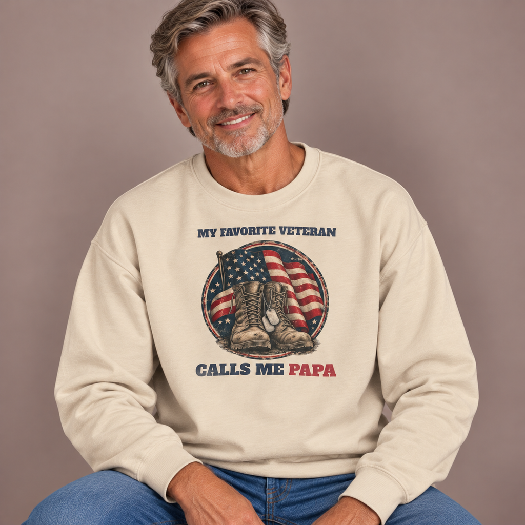 Man wearing the Sand My Favorite Veteran Calls Me Papa Sweatshirt with jeans