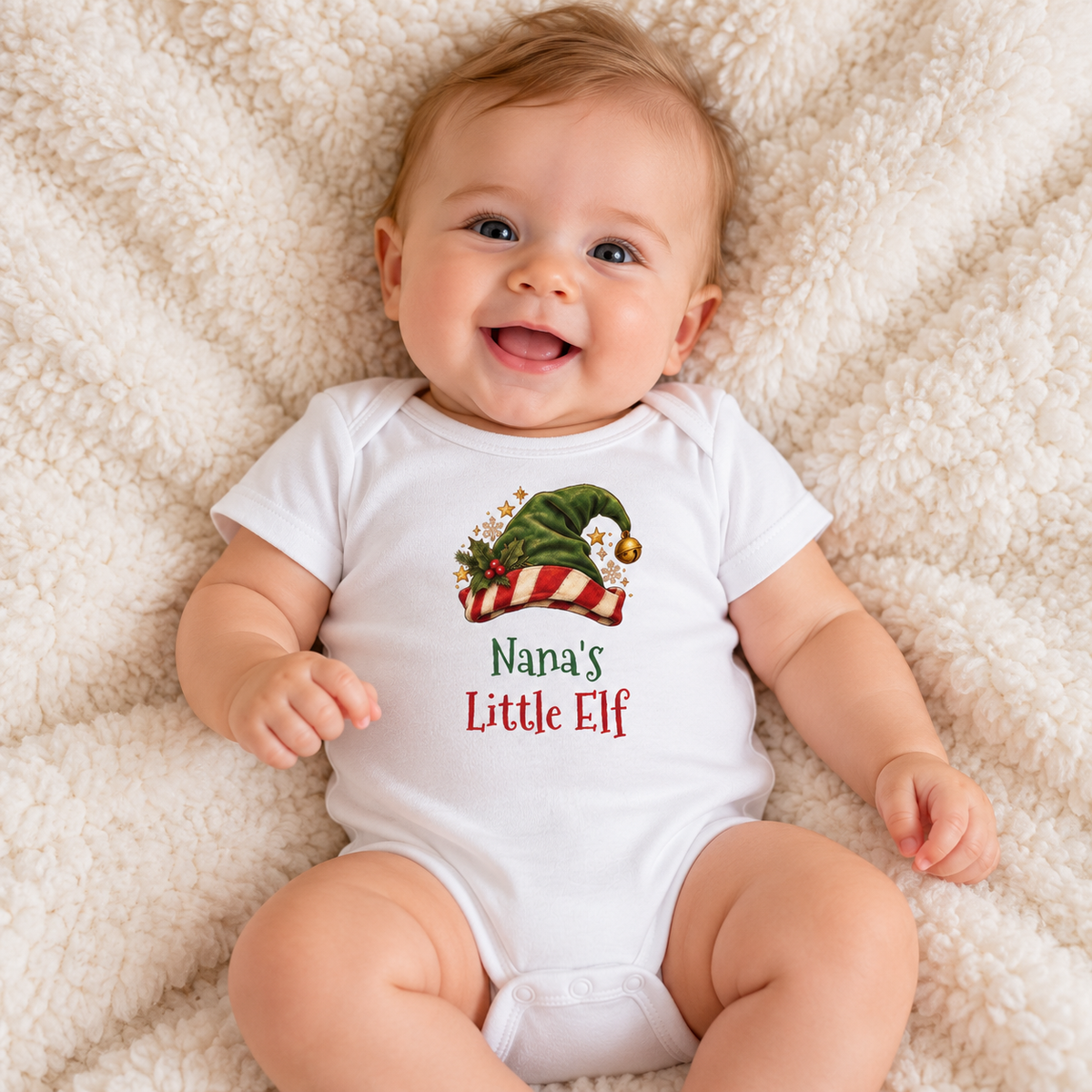 Baby wearing the White Nana's Little Elf Baby Bodysuit