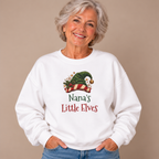 Grandmother wearing the White Nana's Little Elves Sweatshirt with jeans